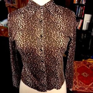 Leopard print button up shirt.